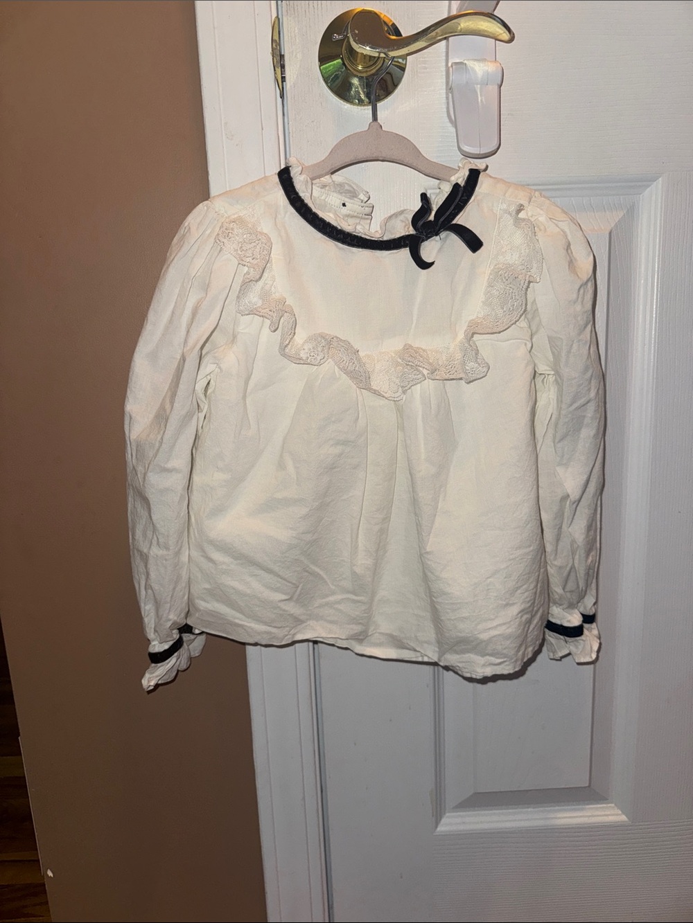 Janie and Jack Cream Long-Sleeve Ruffle Blouse with Black Trim